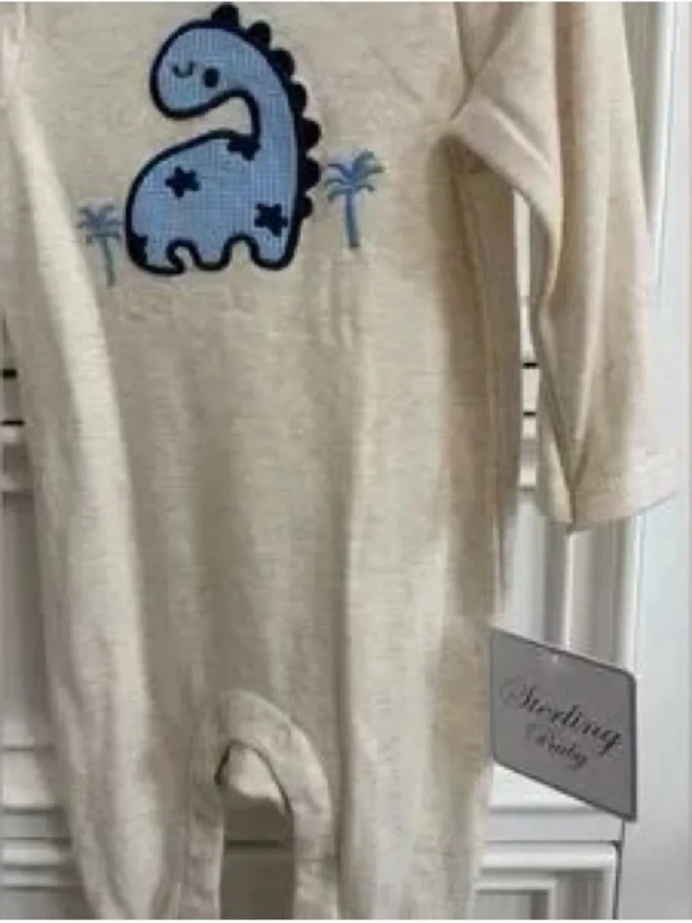 Cream One-Piece with Blue Dino Applique